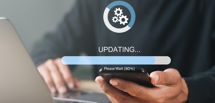Businessman working and installing update process. Software updates or operating system upgrades to keep your device up to date with enhanced functionality in new versions and improved security.